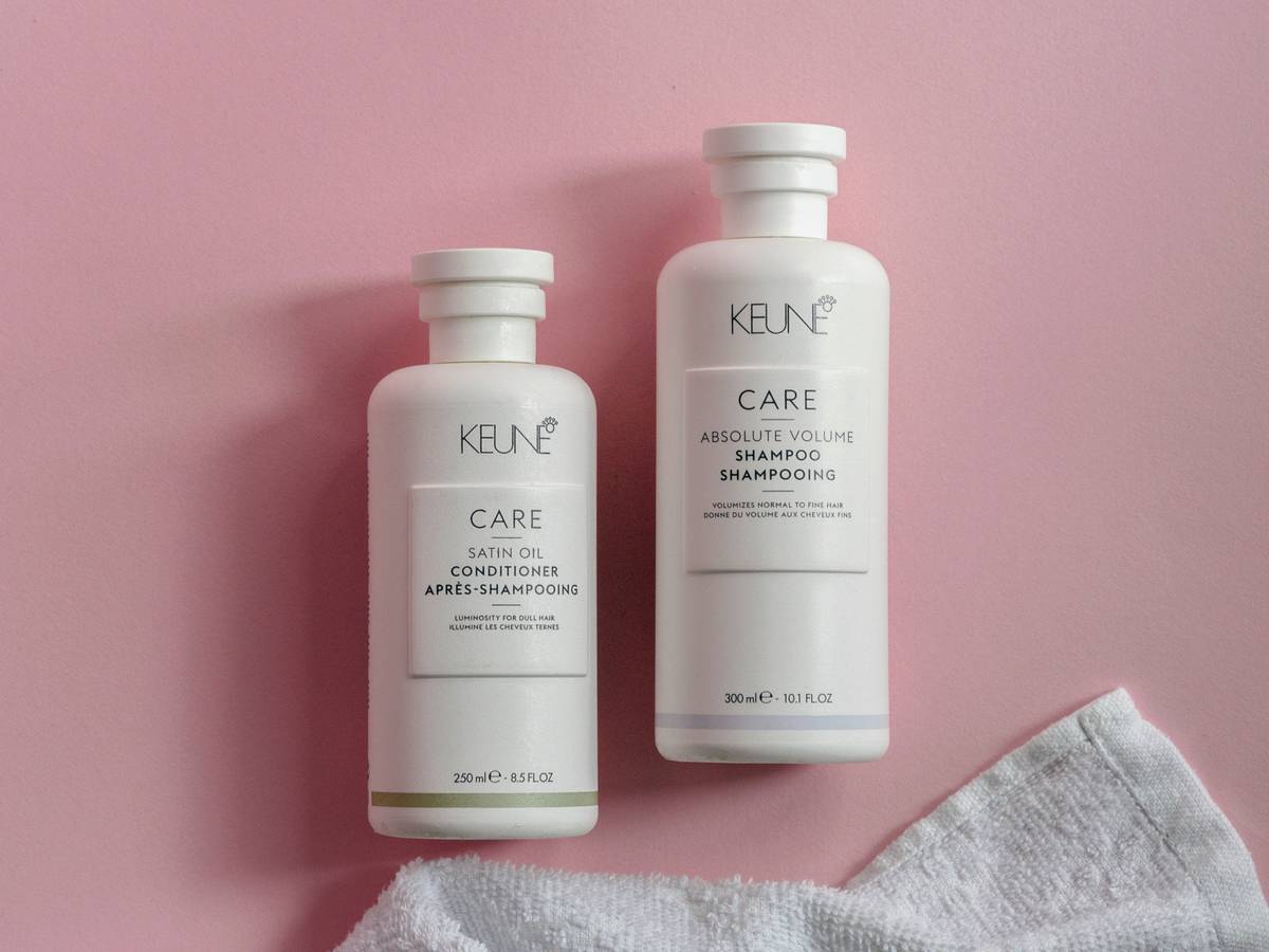 Comparison of three moisturizing conditioner types: rinse-out, leave-in, and deep treatment bottles with ingredient labels visible